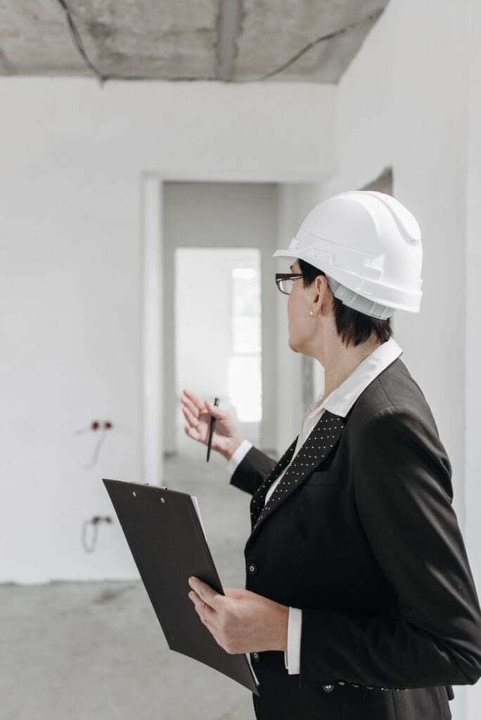 Commercial inspector reviewing building conditions during a commercial inspection
